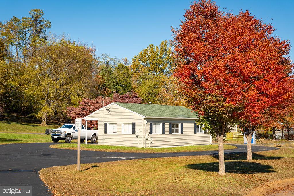 0 Redbud Drive Louisa, VA 23093 - Photo 7 of 16 a front view of a house with a yard
