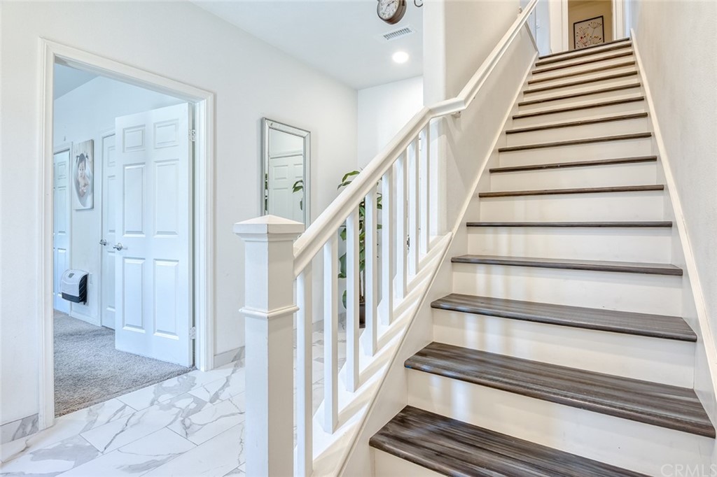 8000 Olive Lane Downey, CA 90241 - Photo 13 of 39 a view of staircase with white walls