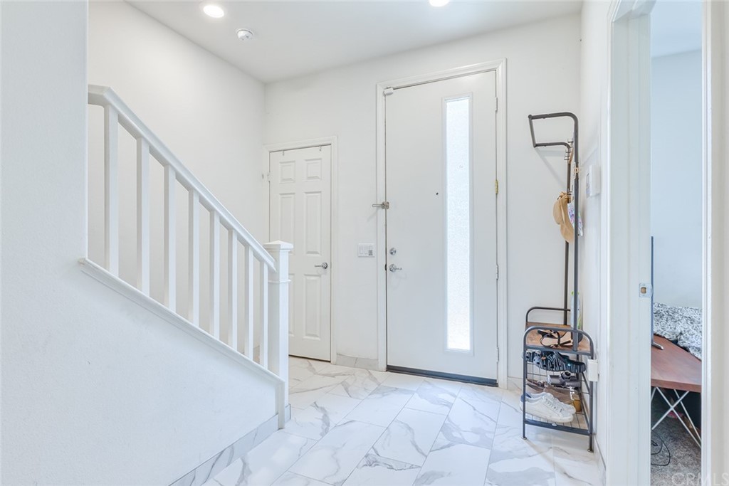8000 Olive Lane Downey, CA 90241 - Photo 14 of 39 a view of an entryway with stairs