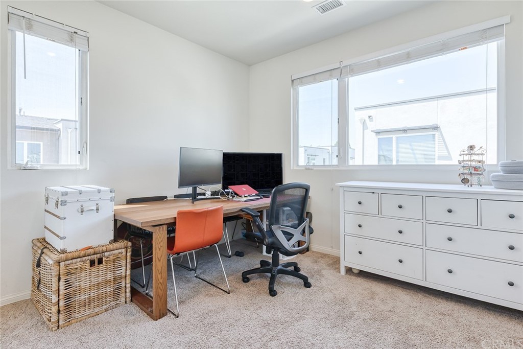 8000 Olive Lane Downey, CA 90241 - Photo 20 of 39 a view of a workspace with furniture