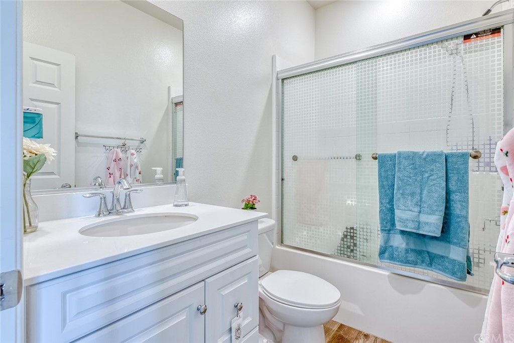 8000 Olive Lane Downey, CA 90241 - Photo 22 of 39 a bathroom with a sink toilet and shower