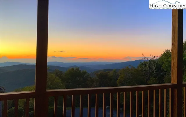a view of balcony with furniture