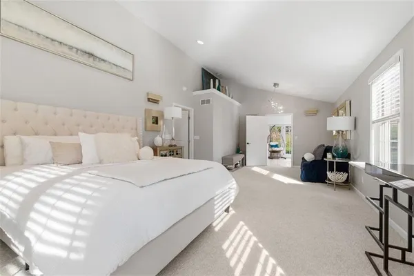 a kitchen with stainless steel appliances granite countertop a lot of counter space and wooden floors