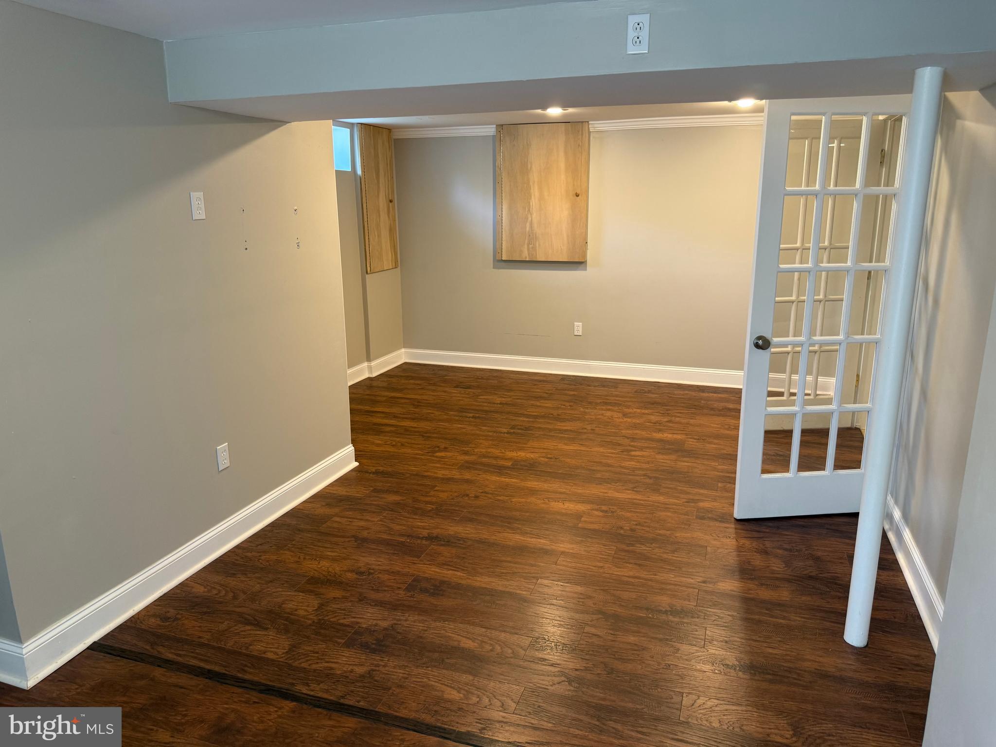 858 Star Court Union Bridge, MD 21791 - Photo 24 of 37 a view of an empty room with wooden floor and a window