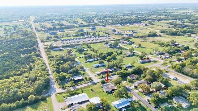 10508 County Road 904 Princeton, TX 75407 - Photo 6 of 8 an aerial view of residential houses with outdoor space