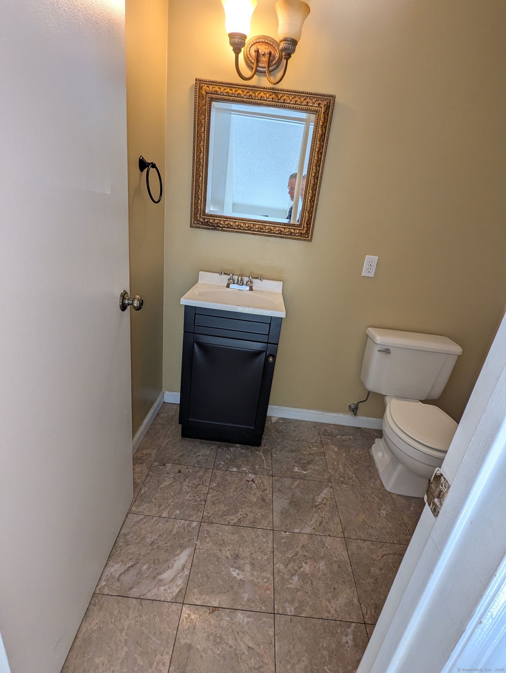 925 Oronoke Road, Unit 38F Waterbury, CT 06708 - Photo 7 of 15 a bathroom with a toilet and a sink