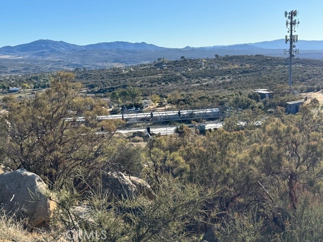 54740 Cave Rock Road Anza, CA 92539 - Photo 35 of 47 a view of a town with mountains in the background