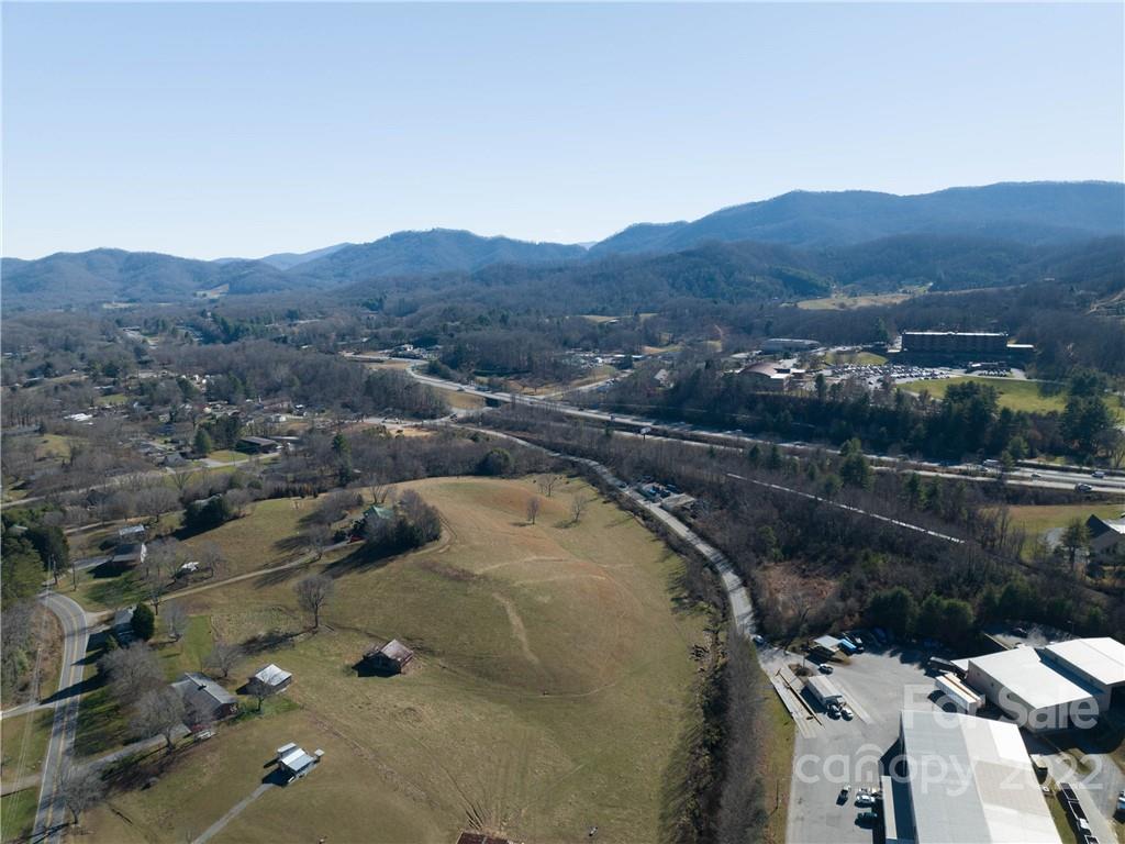 0 Old Clyde Road Clyde, NC 28721 - Photo 12 of 17 an aerial view of a house with a lake view