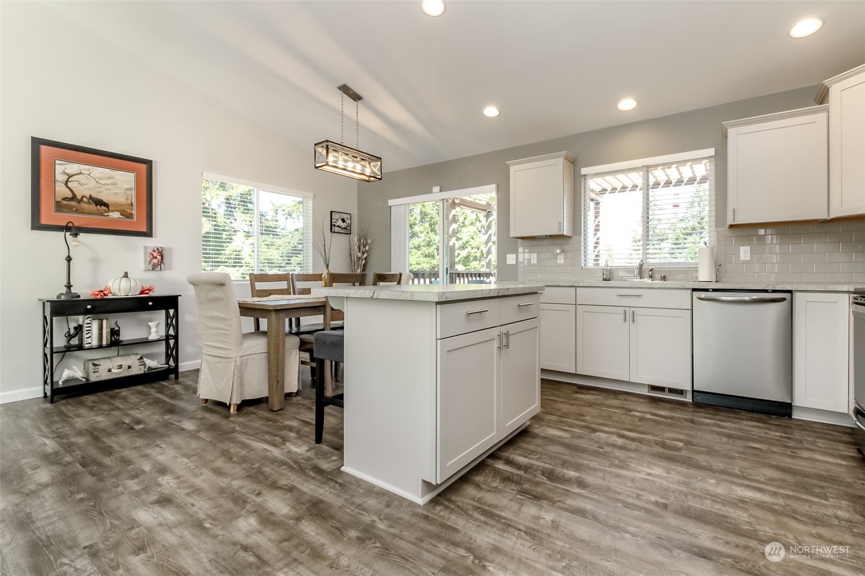 18217 Lawton Lane Southwest Rochester, WA 98579 - Photo 11 of 40 a kitchen with refrigerator and cabinets