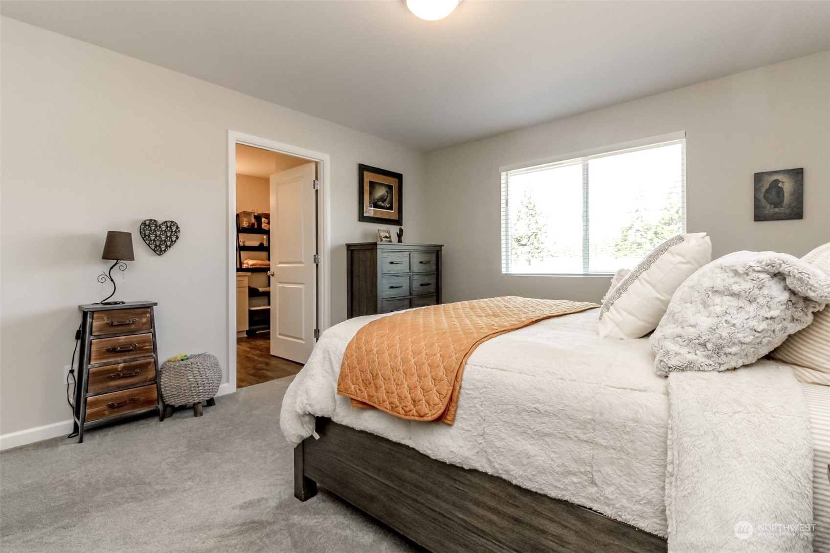 18217 Lawton Lane Southwest Rochester, WA 98579 - Photo 16 of 40 a bedroom with a bed and a window
