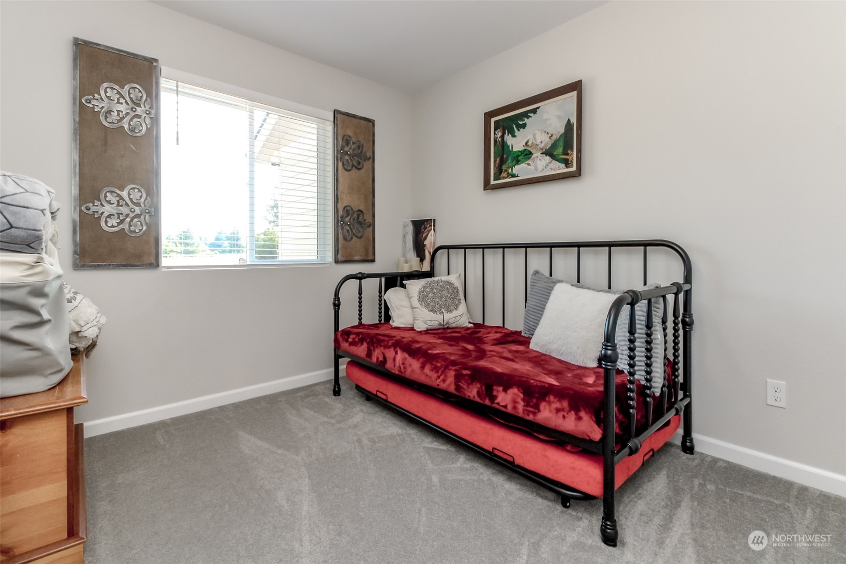 18217 Lawton Lane Southwest Rochester, WA 98579 - Photo 22 of 40 a bed sitting in a bedroom next to a window
