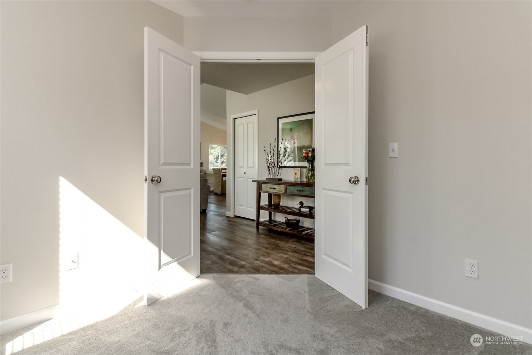 18217 Lawton Lane Southwest Rochester, WA 98579 - Photo 23 of 40 an entryway with a livingroom and a bathroom with sink