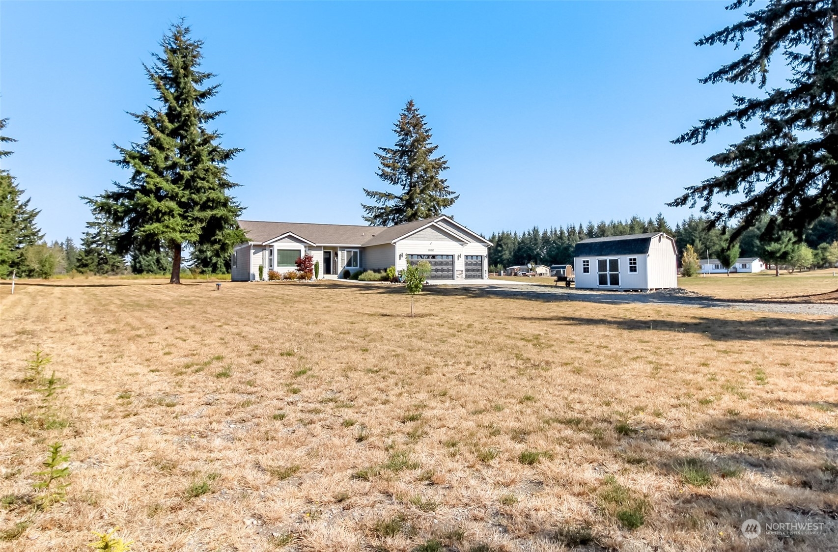 18217 Lawton Lane Southwest Rochester, WA 98579 - Photo 30 of 40 a house view with a outdoor space