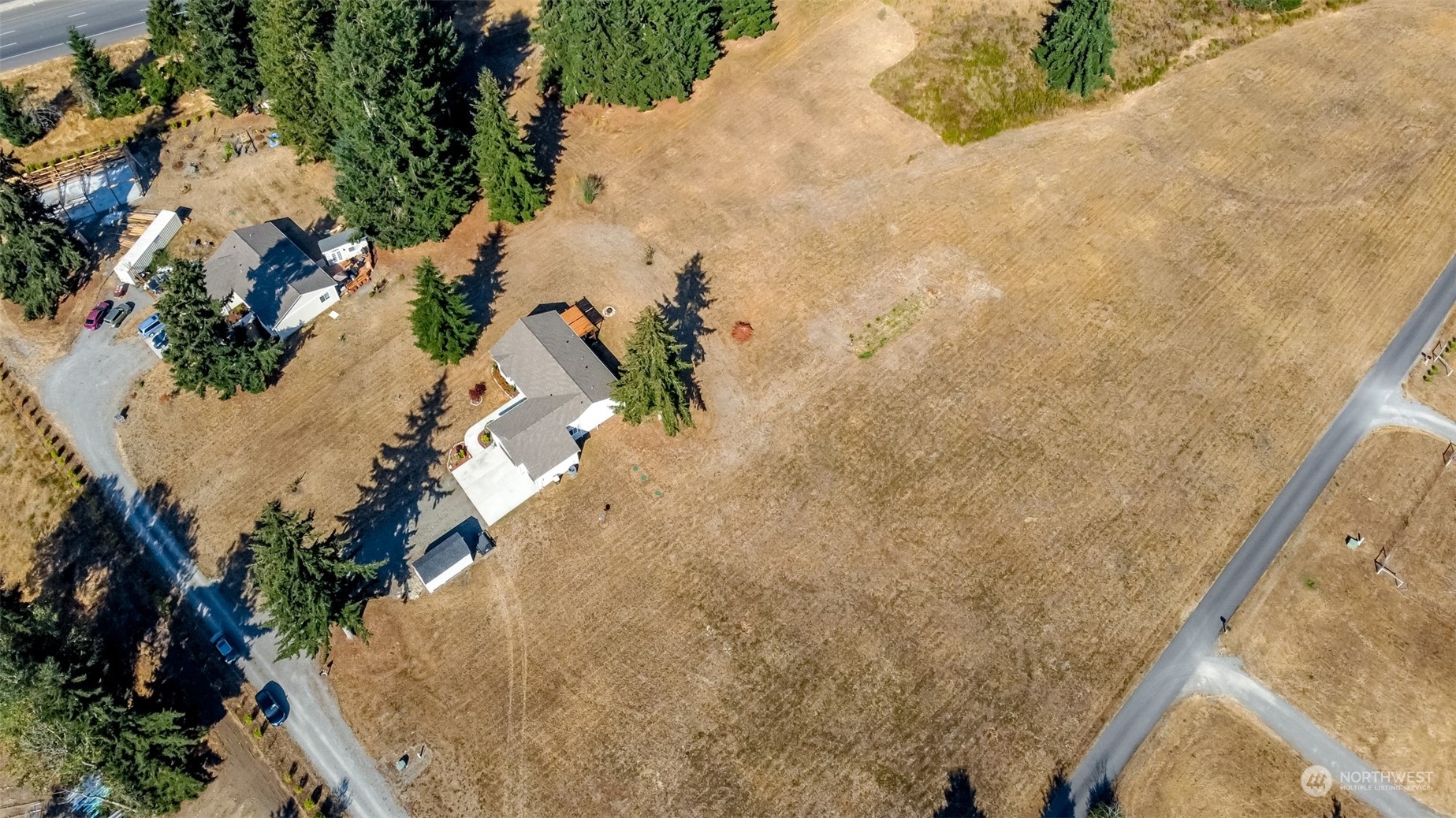 18217 Lawton Lane Southwest Rochester, WA 98579 - Photo 34 of 40 a view of a dry yard with wooden fence