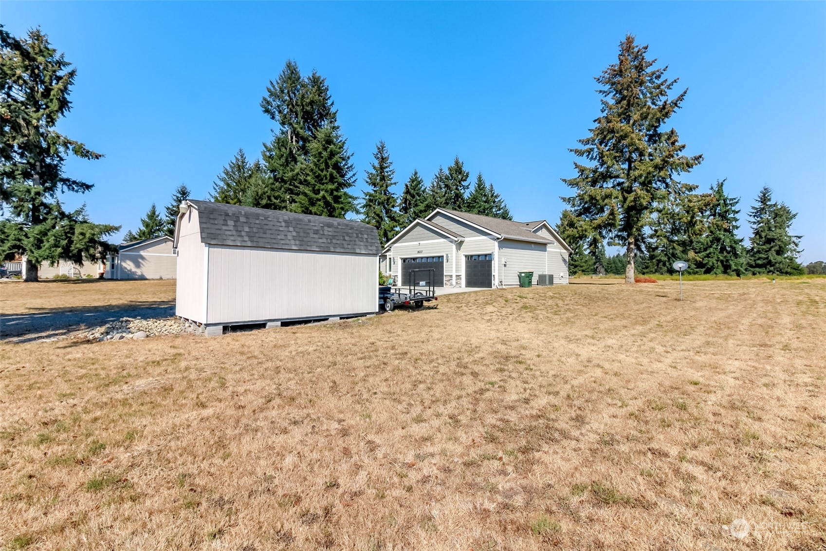 18217 Lawton Lane Southwest Rochester, WA 98579 - Photo 36 of 40 a house with a yard