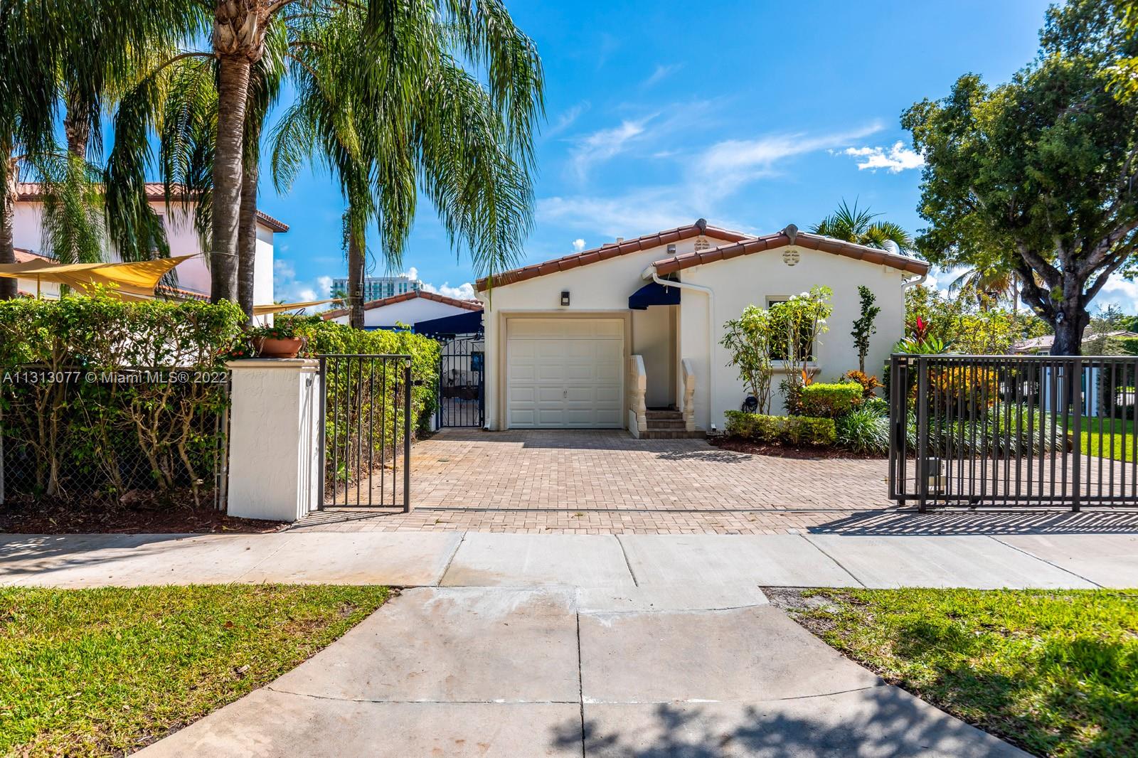 625 Southwest 27th Road Miami, FL 33129 - Photo 23 of 29 a view of a house with a patio