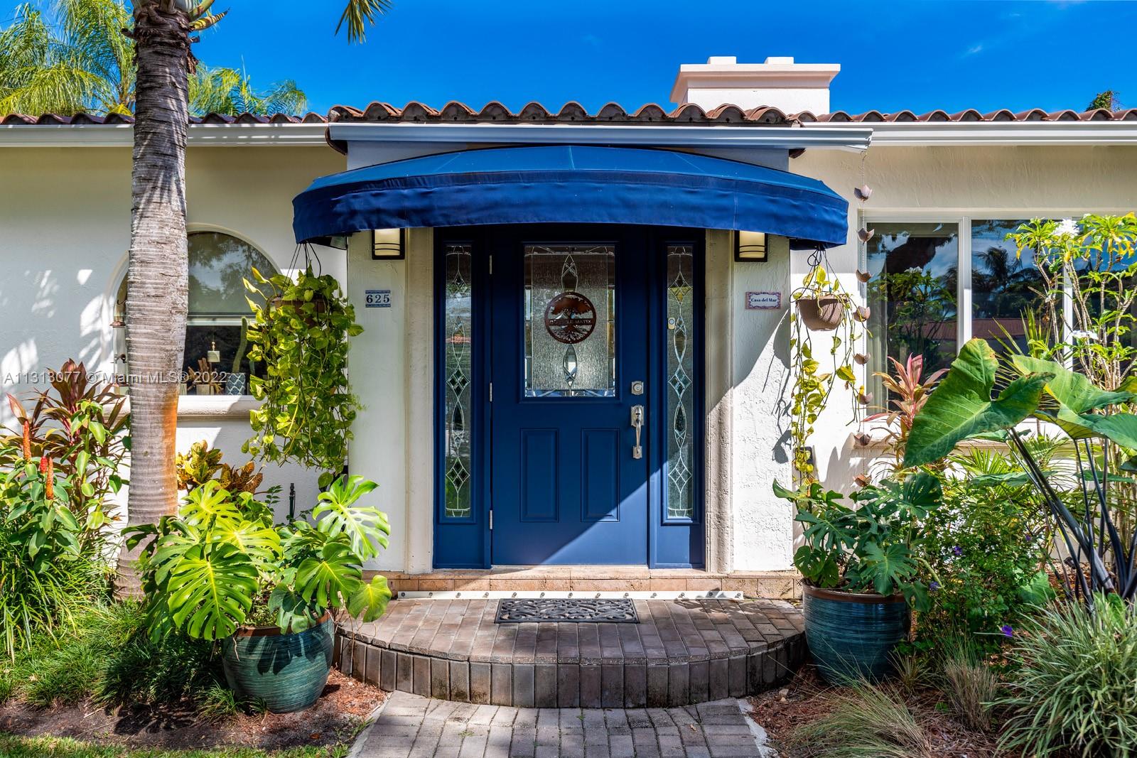 625 Southwest 27th Road Miami, FL 33129 - Photo 3 of 29 a view of a entryway door of house and front door