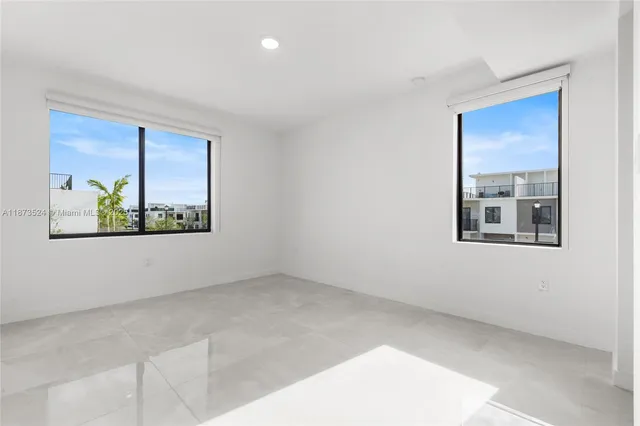 a view of an empty room with window