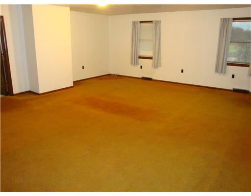 263 Davis Road Dawson, PA 15428 - Photo 8 of 18 Family Room. Be creative as this room is large enough for playroom, pool table or a dining area during those special holidays.
