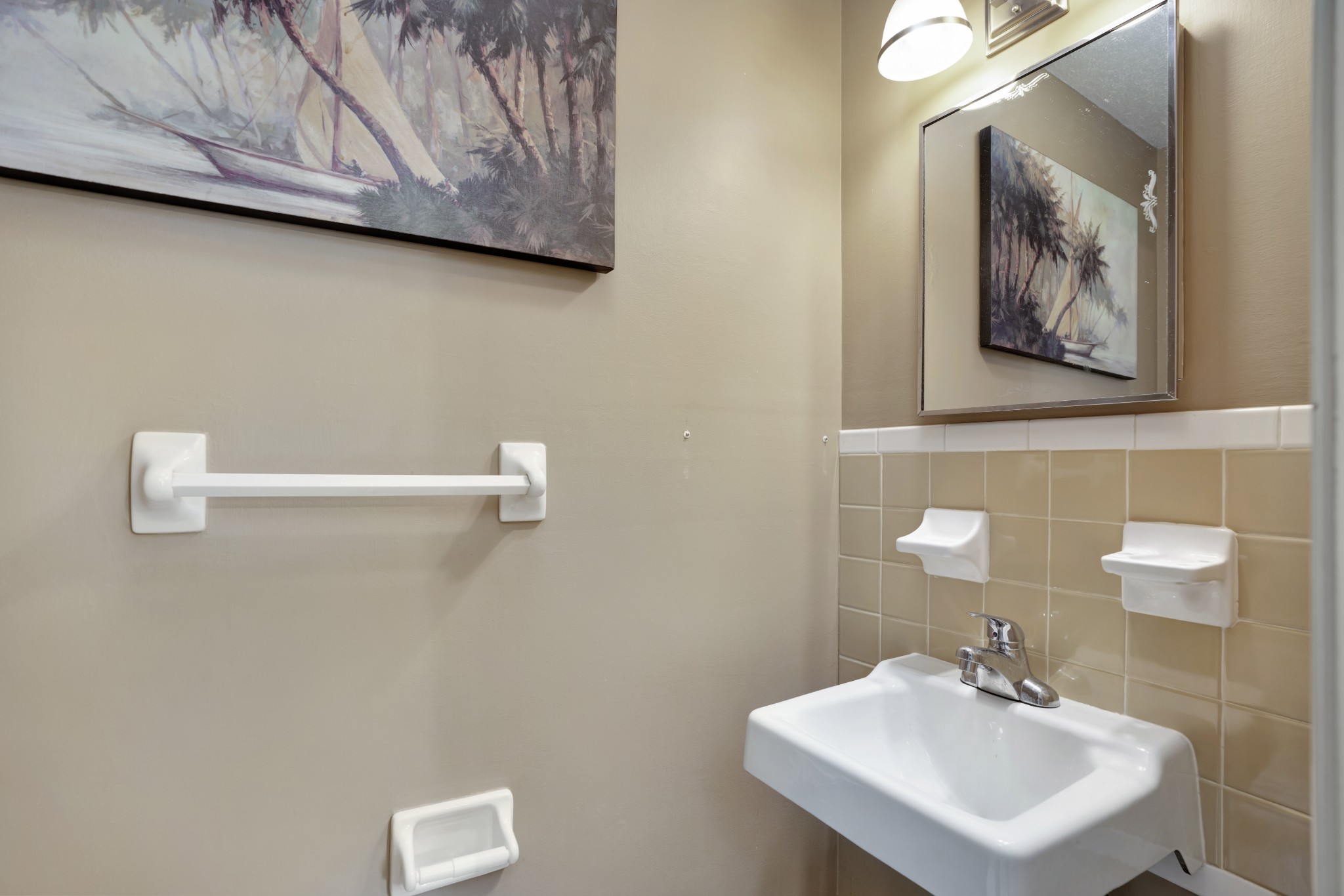 349 Dean Road Clarksville, TN 37040 - Photo 14 of 28 a bathroom with a sink and a mirror