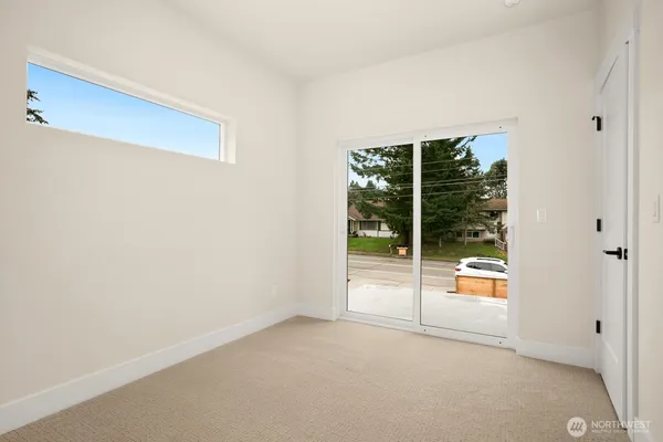 a view of an empty room and window