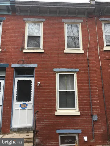 a brick building with a door