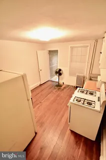 a living room with a couch and a table