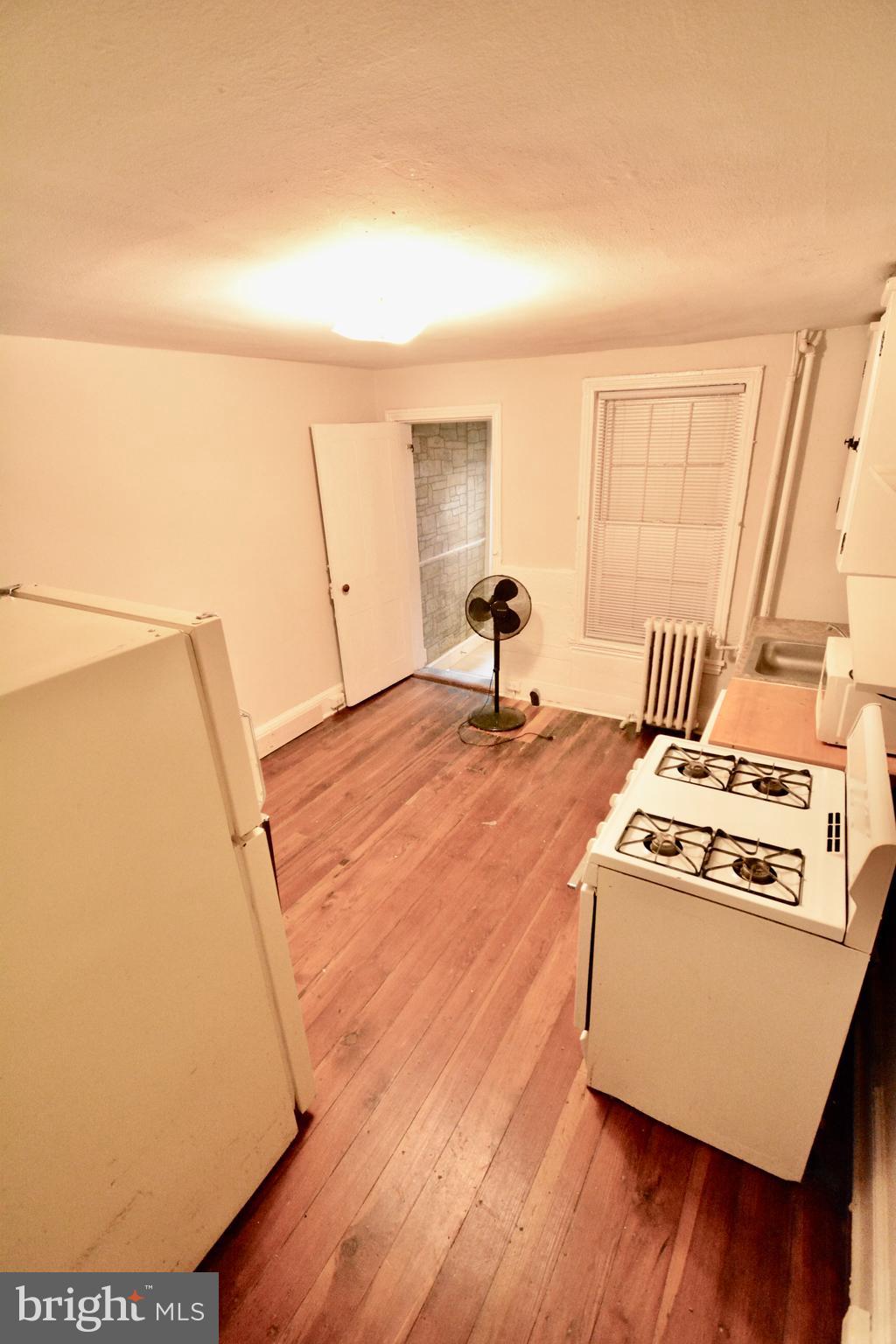 2 Penn Court Philadelphia, PA 19144 - Photo 5 of 13 a living room with a couch and a table