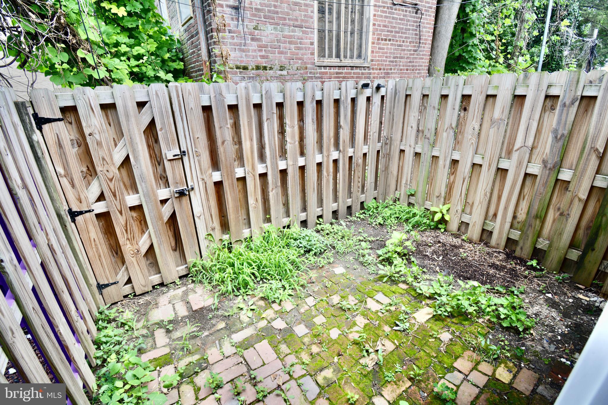 2 Penn Court Philadelphia, PA 19144 - Photo 7 of 13 a view of a wooden fence