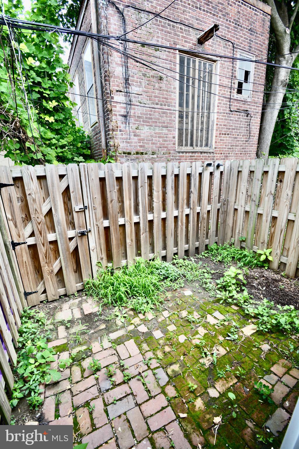 2 Penn Court Philadelphia, PA 19144 - Photo 8 of 13 a view of a house with a garden