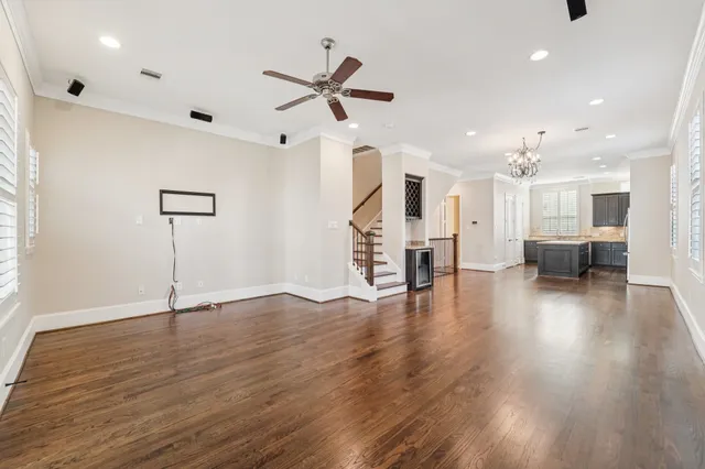 a kitchen with granite countertop a stove and a microwave