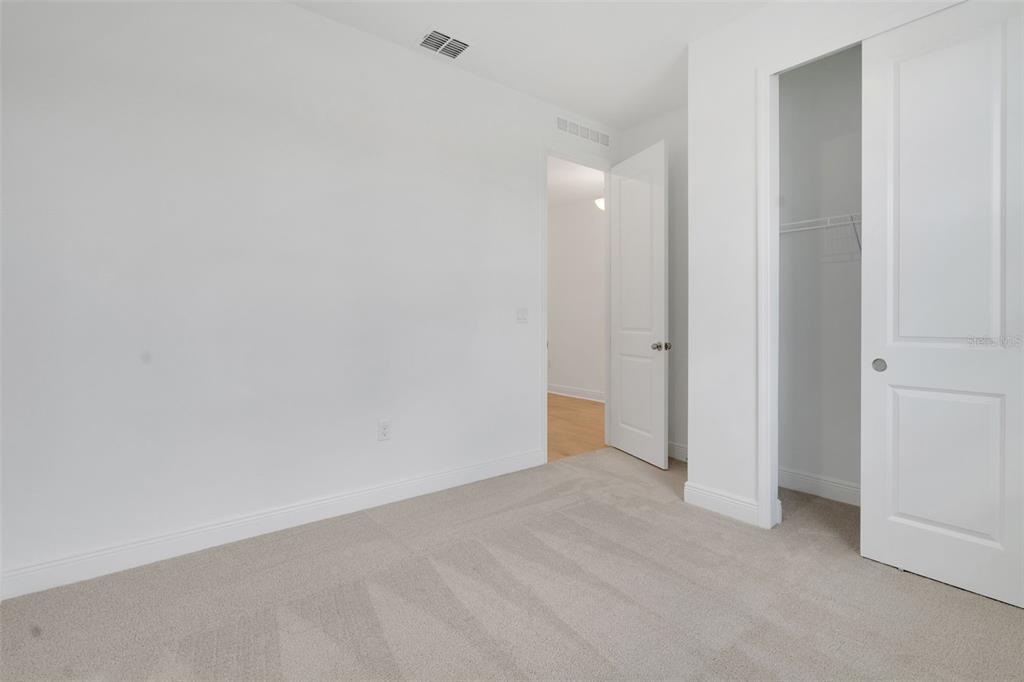 1018 Swamp Chestnut Loop Lady Lake, FL 32159 - Photo 11 of 35 a view of an empty room