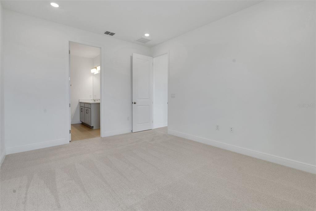 1018 Swamp Chestnut Loop Lady Lake, FL 32159 - Photo 22 of 35 a view of an empty room