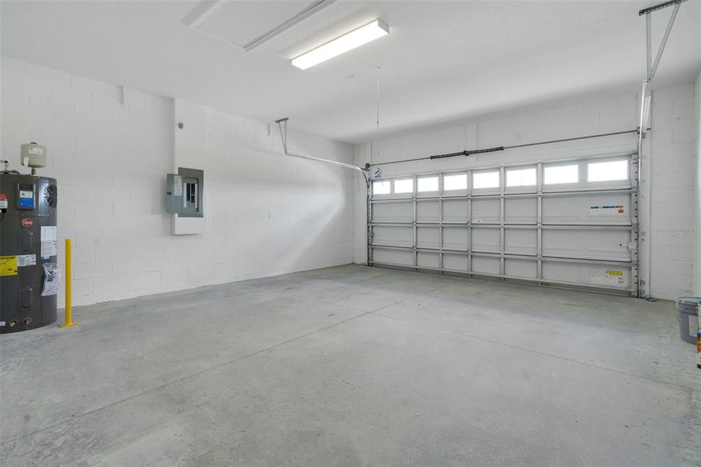 1018 Swamp Chestnut Loop Lady Lake, FL 32159 - Photo 29 of 35 a view of a garage