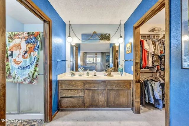 a view of living room with granite countertop furniture and a fireplace