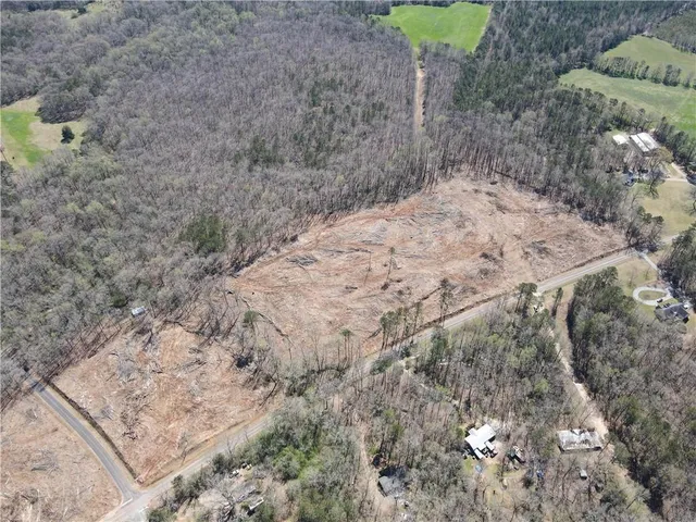 a view of a backyard of the house