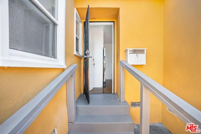 a view of stairs and with wooden floor