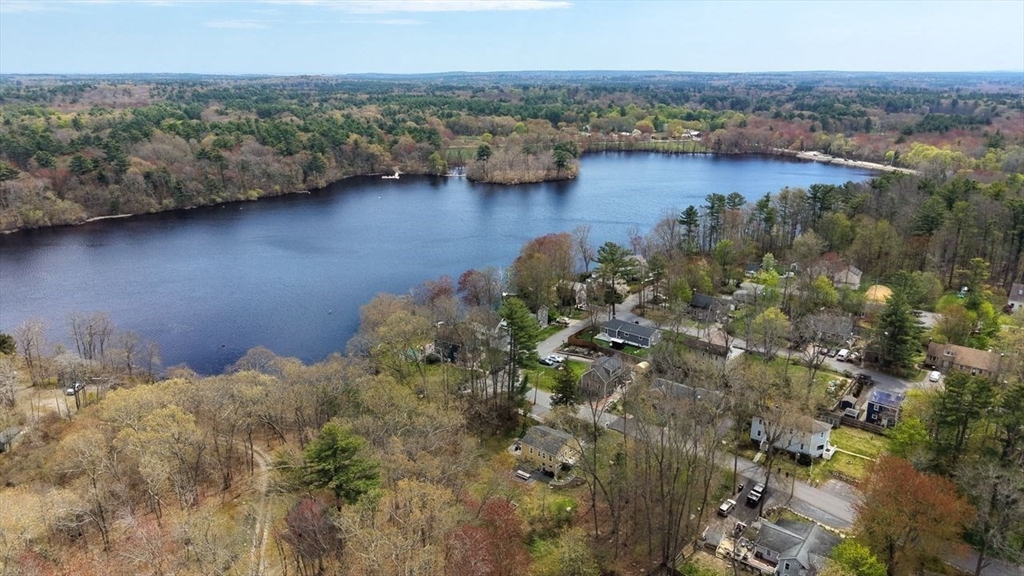 15 Leigh Road Norwell, MA 02061 - Photo 31 of 34 a view of a lake with plants and large trees