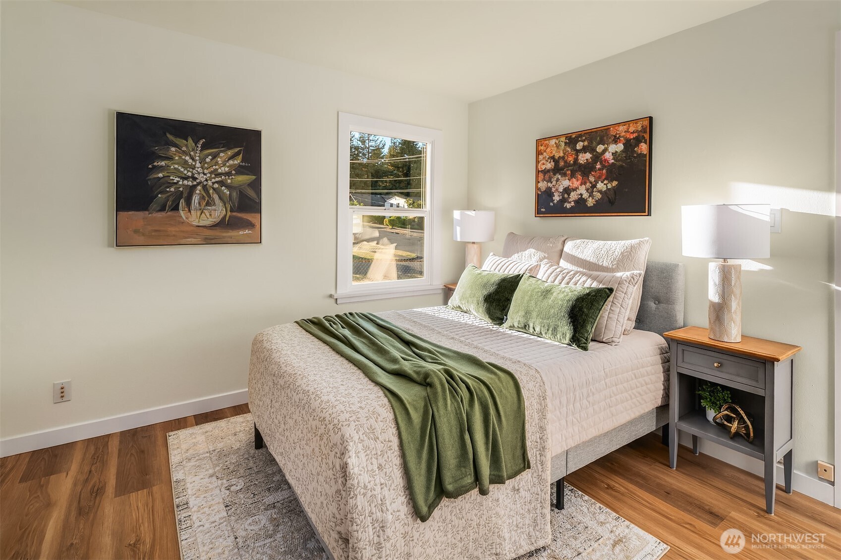 2222 North 29th Street Tacoma, WA 98403 - Photo 11 of 26 a bedroom with a bed and a lamp on dresser