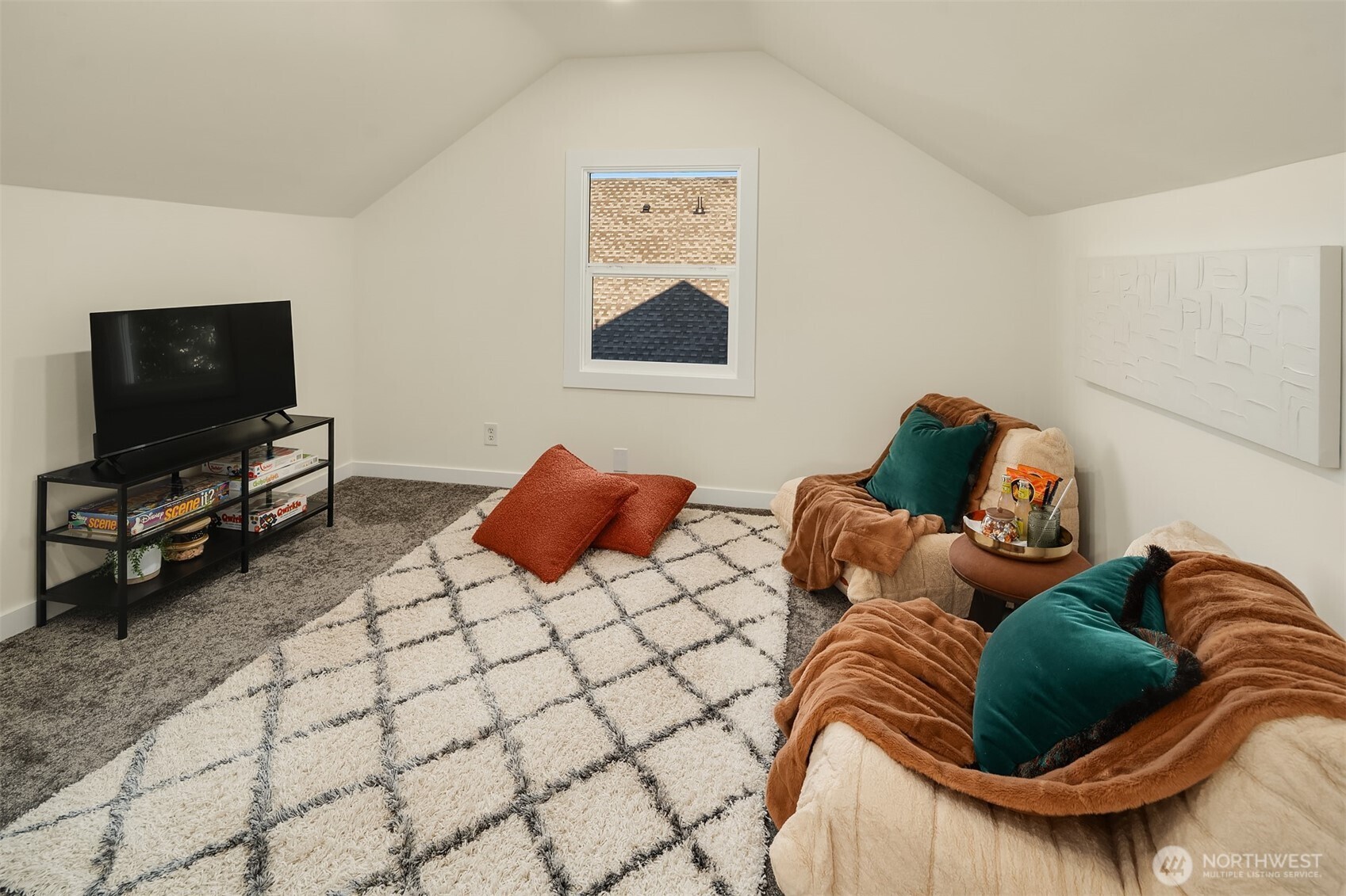 2222 North 29th Street Tacoma, WA 98403 - Photo 18 of 26 a living room with furniture and a flat screen tv