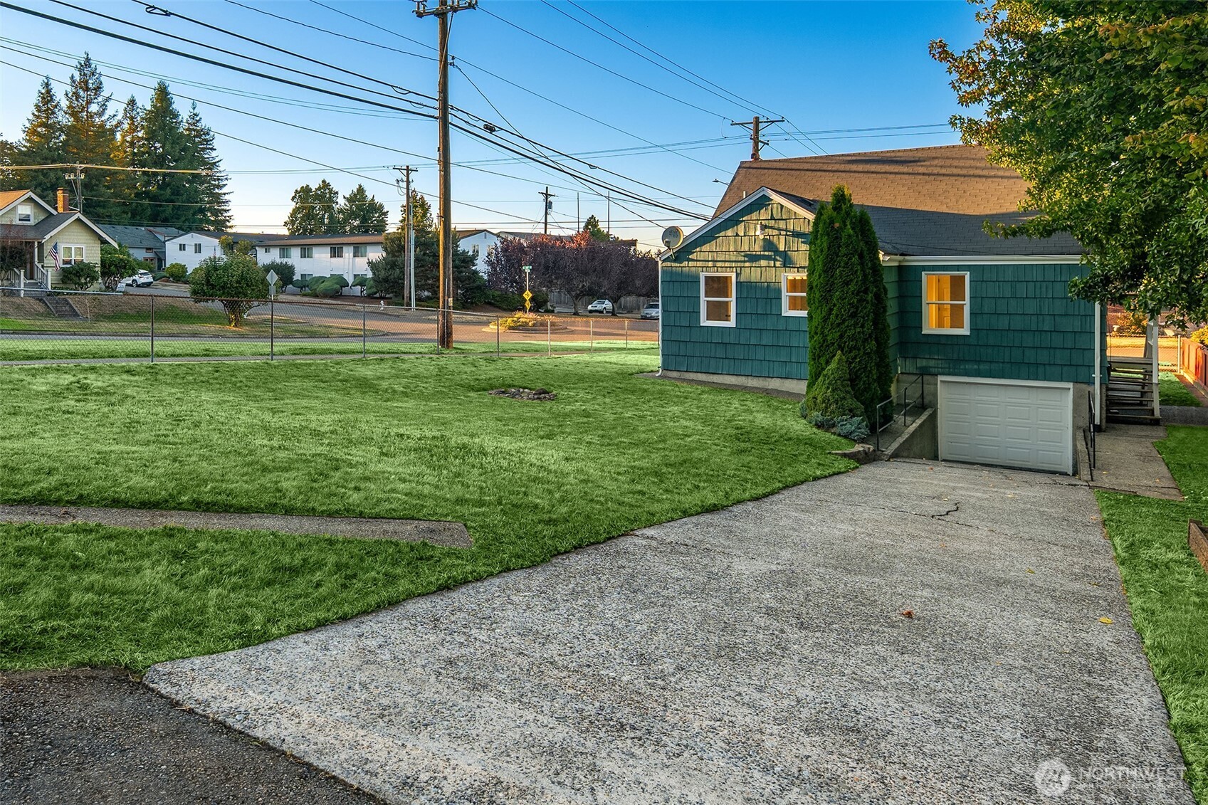 2222 North 29th Street Tacoma, WA 98403 - Photo 22 of 26 a front view of a house with a yard