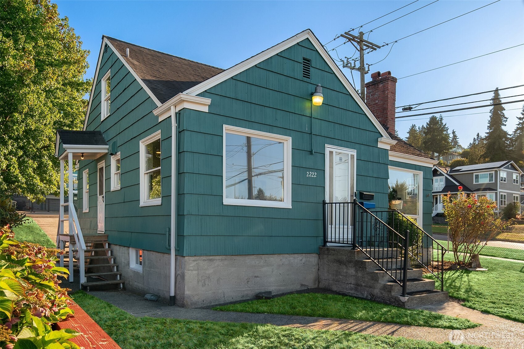 2222 North 29th Street Tacoma, WA 98403 - Photo 23 of 26 a front view of a house with garden