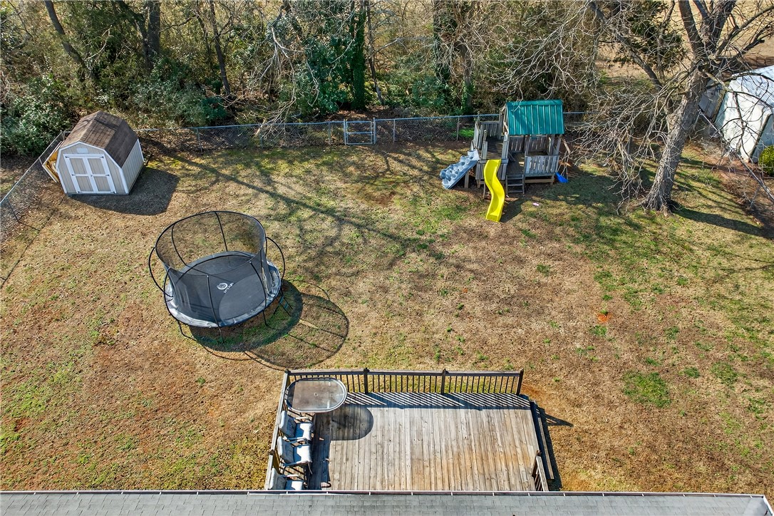 310 Gracie Street Seneca, SC 29678 - Photo 32 of 34 This spacious backyard offers abundant room for outdoor enjoyment and relaxation.
