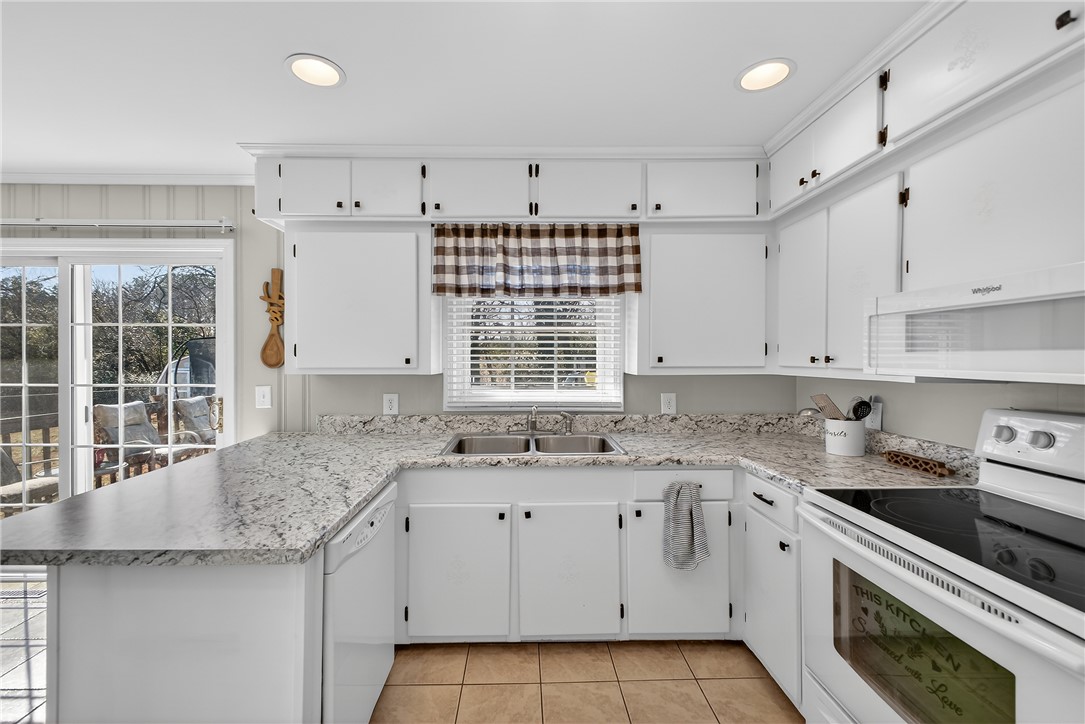 310 Gracie Street Seneca, SC 29678 - Photo 10 of 34 This bright kitchen offers functional design and direct access to outdoor living.
