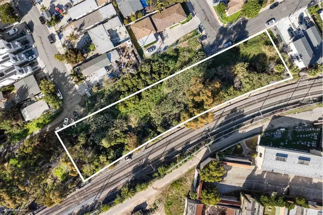 a view of balcony with wooden floor