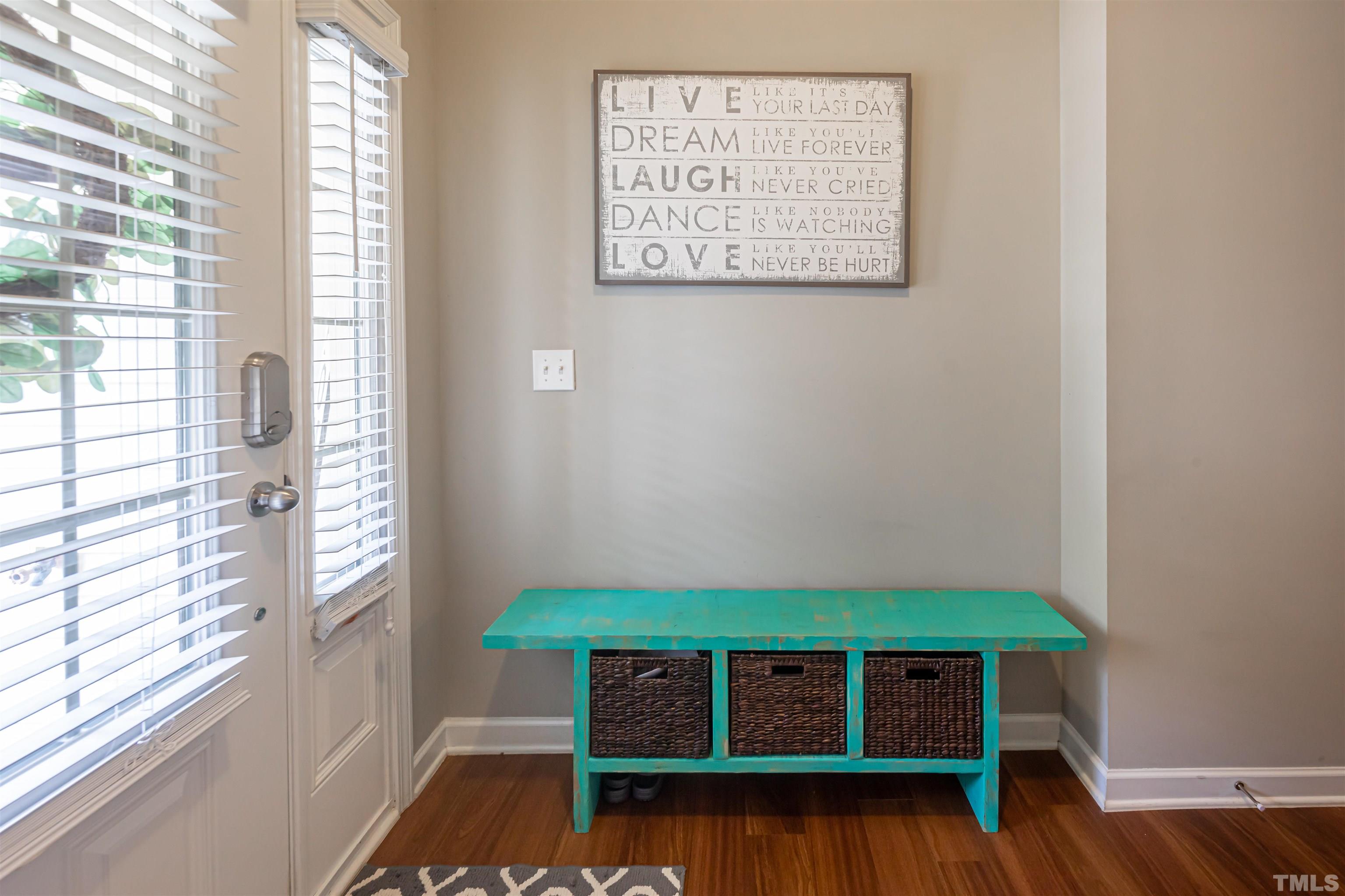 1427 Chatuga Way Wake Forest, NC 27587 - Photo 15 of 36 a view of room with window and wooden floor