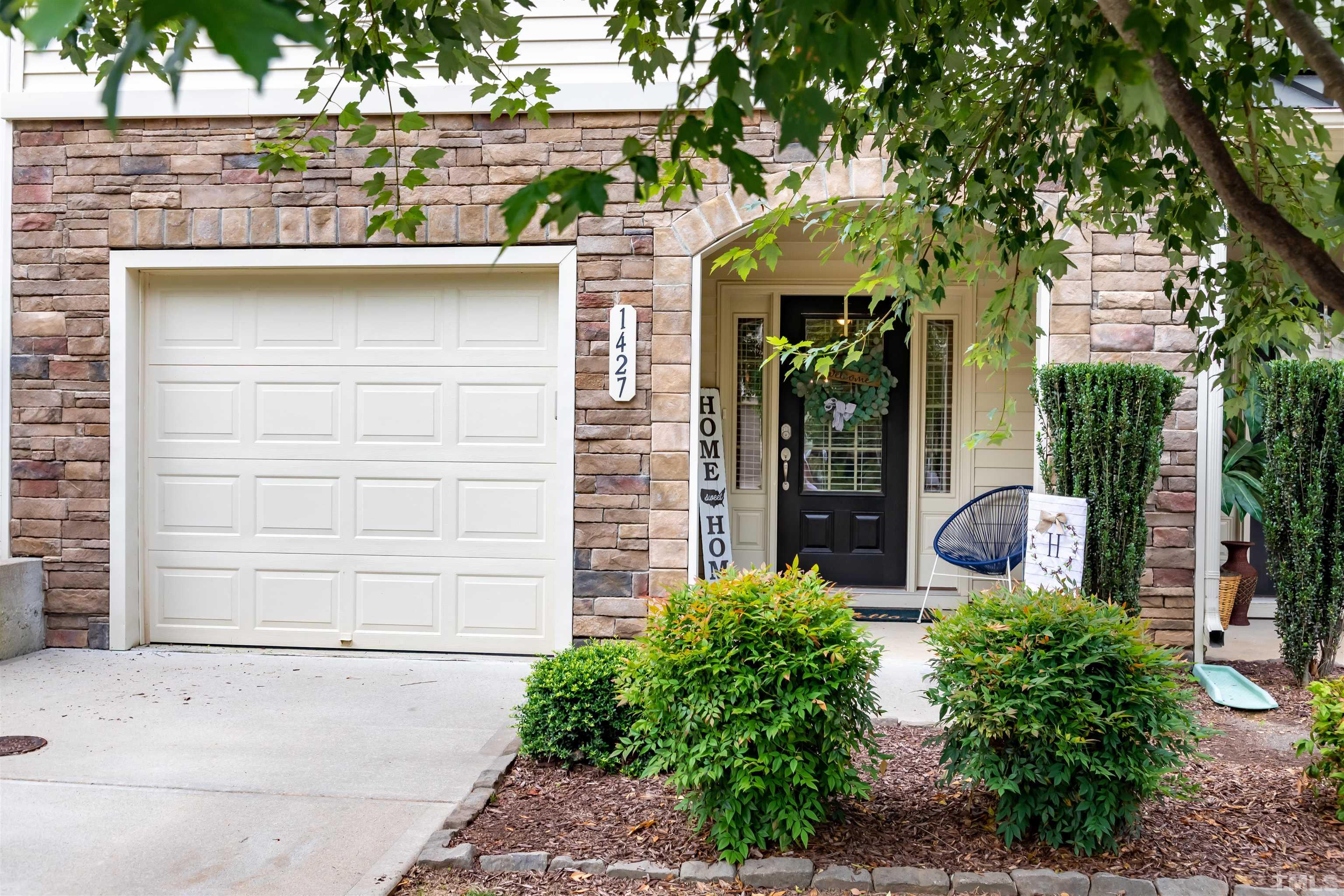 1427 Chatuga Way Wake Forest, NC 27587 - Photo 2 of 36 a view of a chair and table in the house front