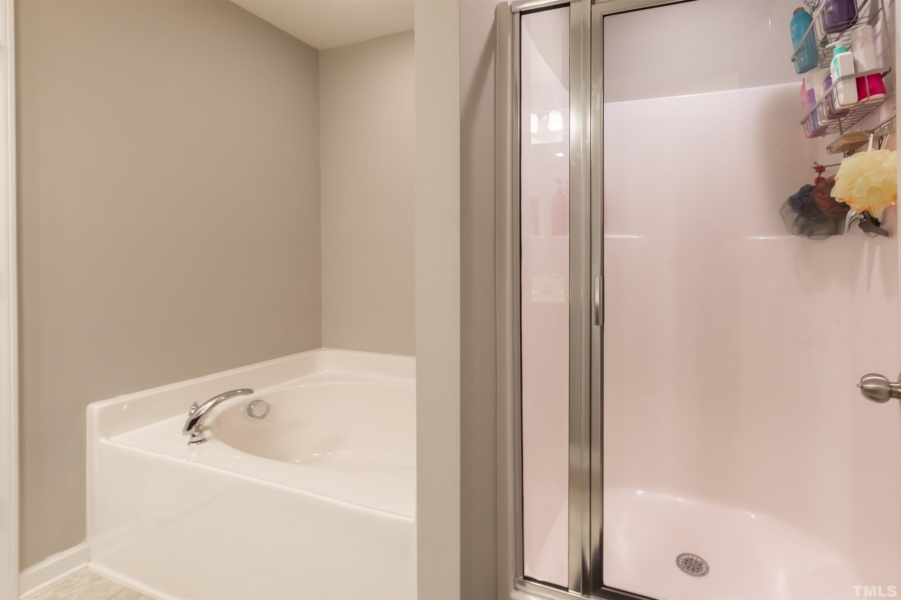 1427 Chatuga Way Wake Forest, NC 27587 - Photo 25 of 36 a bathroom with a bathtub