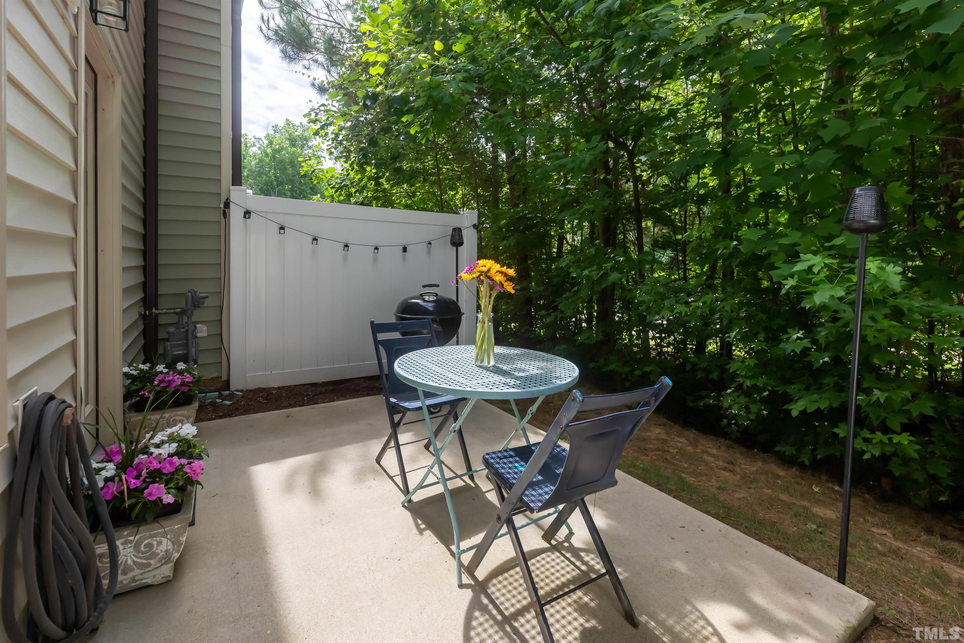 1427 Chatuga Way Wake Forest, NC 27587 - Photo 36 of 36 a view of a chairs and table in the patio