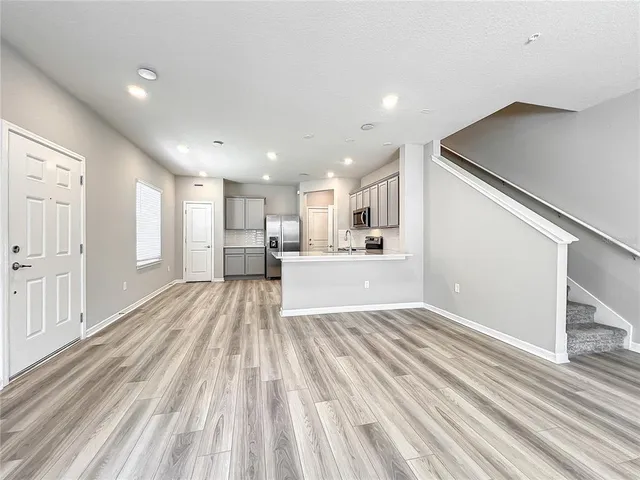 a bathroom with a sink double vanity and a mirror